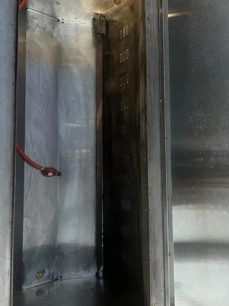 Inside of a hog roast machine after a deep clean